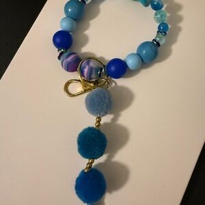 Blue Beaded keychain with Pom Pom Charm